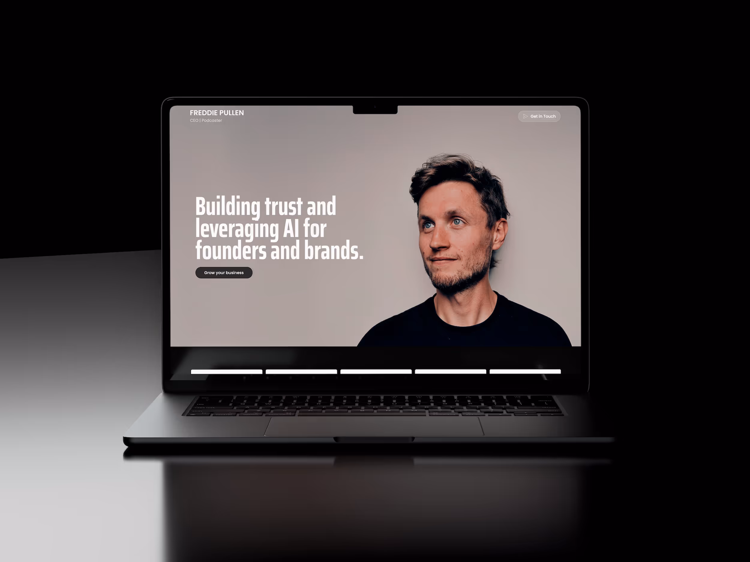 Freddie Pullen personal brand website displayed on a laptop