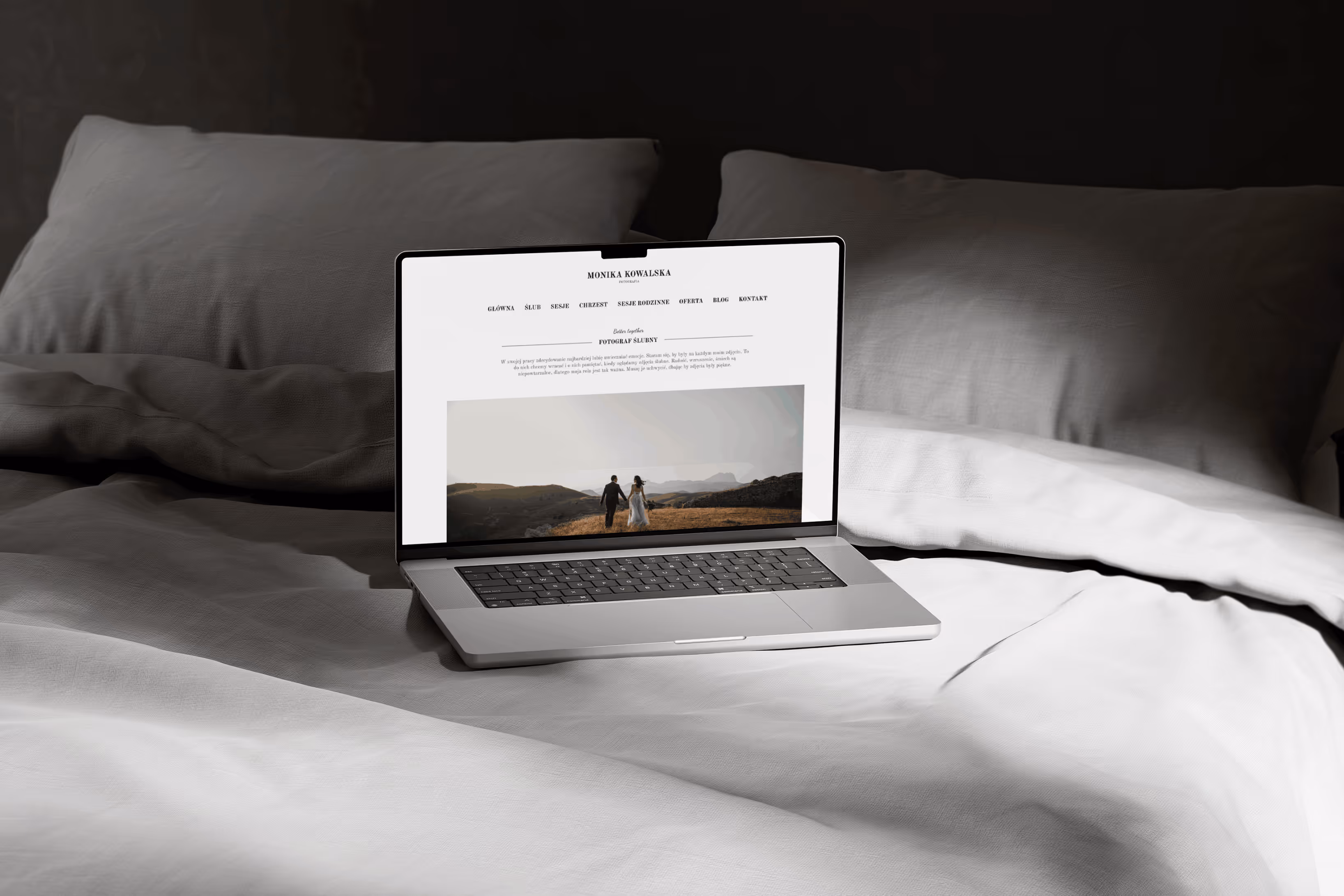 Wedding photographer portfolio website displayed on a laptop